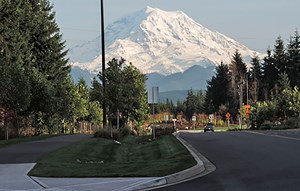 View of Mt.Rainier from the corner of Overlook Dr. and Cascadia Blvd on a clear sky day in Summer