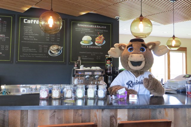 Tacoma Rainiers Mascot Rhubarb helps the staff at the cafe