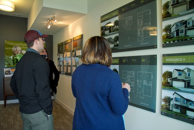 New Home Buyers Check Out Their Selections
