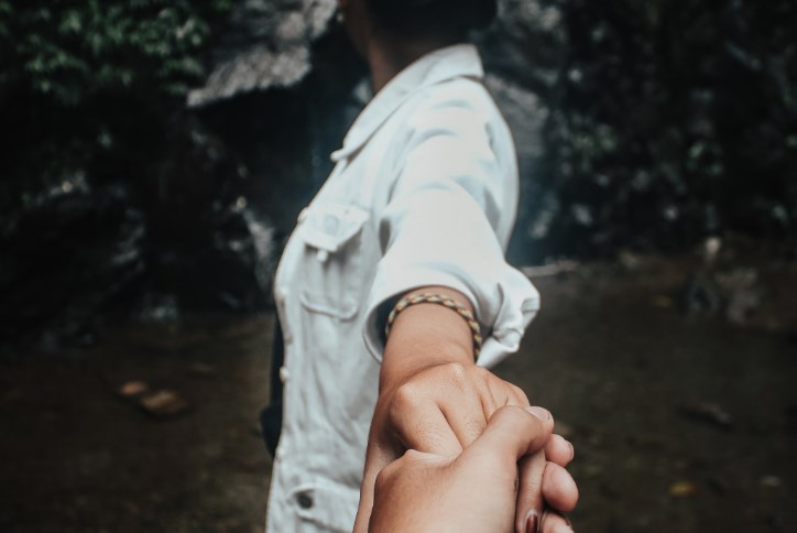 Couple holding hands.png