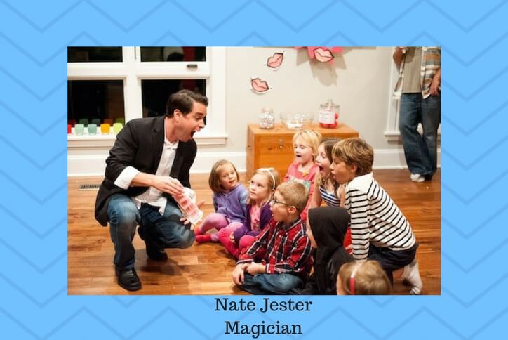 Magician performing card trick for kids.