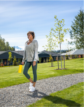 Tehaleh community resident walking in Bonney Lake, WA surrounding nature