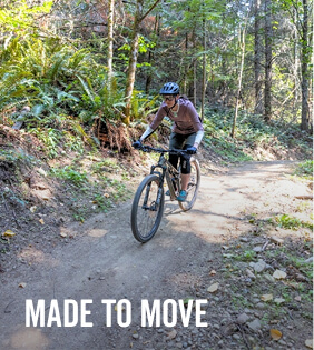 Tehaleh resident biking on forest trails